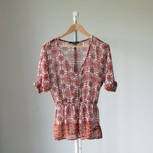 Sheer v-neck peplum top batik design size SM